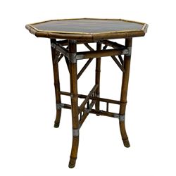 W.F. Needham - Victorian bamboo occasional table, octagonal lacquered top, the bamboo joined by metal brackets, brass cups stamped 'W.F Needham'