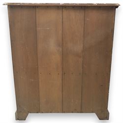 20th century oak Arts and Crafts fitted collector's cabinet, twin panelled doors with metal door pulls, enclosing a fitted interior, on a moulded plinth base