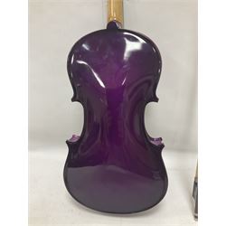 Intermusic 3/4 violin with a violet coloured solid wood body, ebonised fingerboard and fittings, bow and hard case, length 54cm