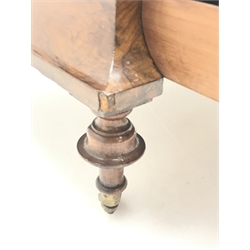  Victorian figured walnut Canterbury, the three divisions with arched pierced scroll detail with turned supports, shaped frieze drawer on mushroom turned supports with brass sockets and ceramic castors, W62cm, D42cm, H57cm (MAO1203)  
