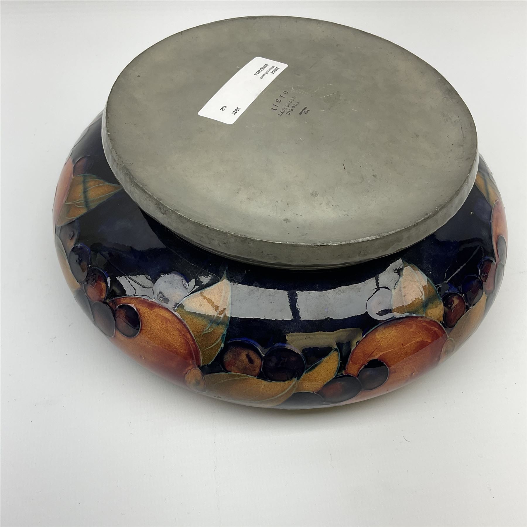 A William Moorcroft bowl on Tudric Pewter base, circa 1914, decorated