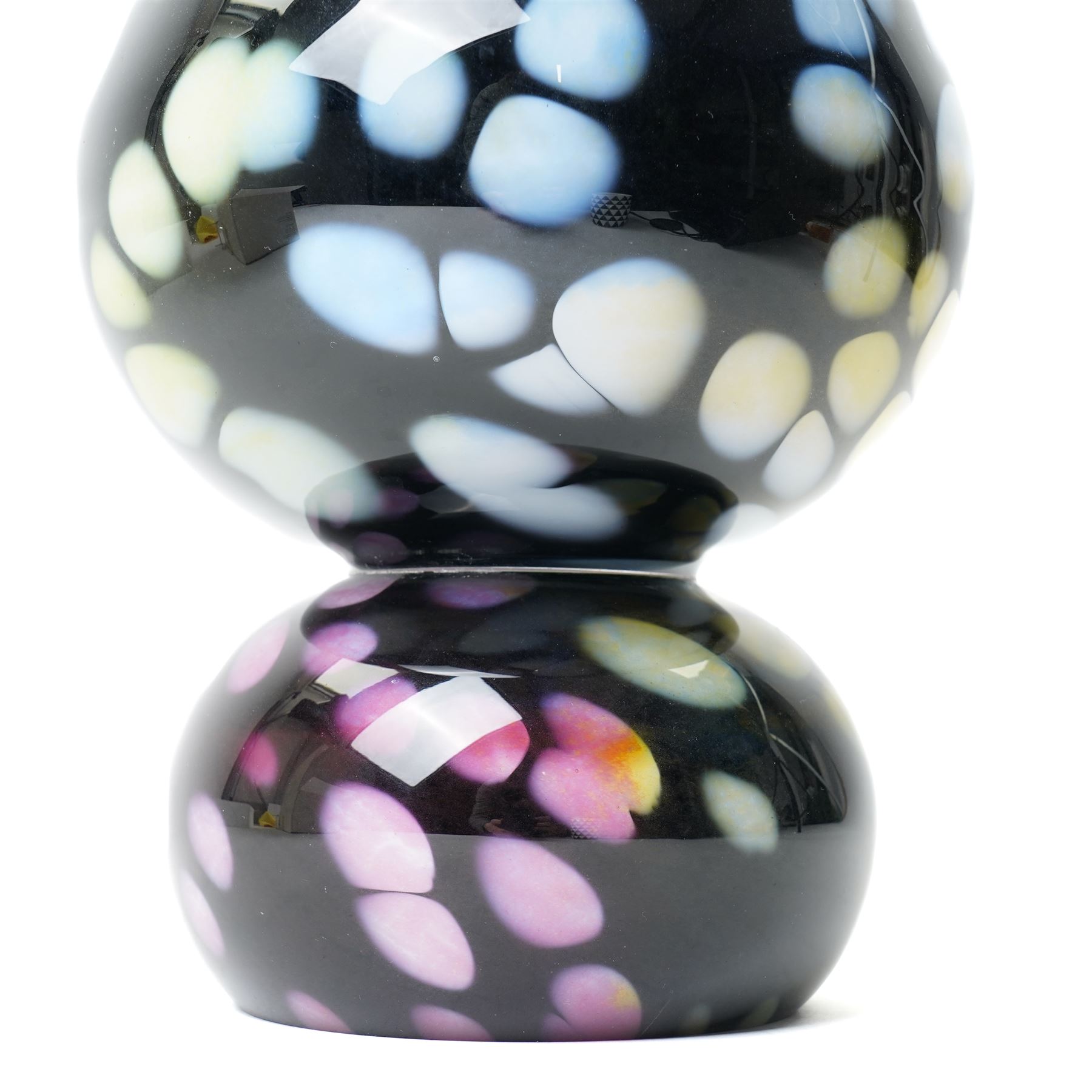 Ludvig Lofgren for Kosta Boda vase, decorated with mottled detail in purples and greens, upon a black ground, signed beneath, H46cm