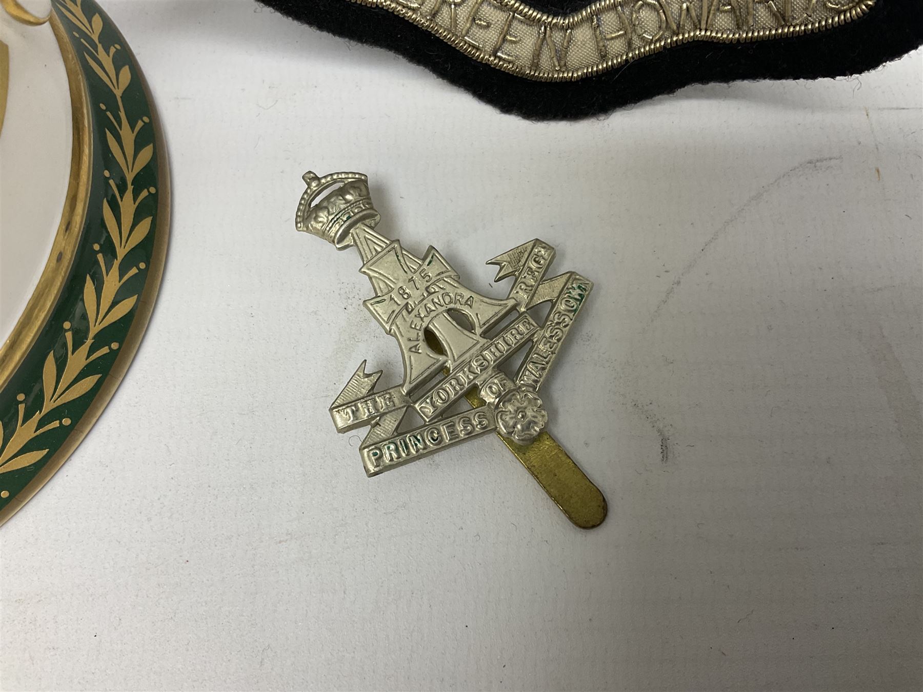 Limited edition Spode Green Howard's twin handled loving mug, no 205/300, with certificates, together with a Green Howards cased Tercentenary medal (1688-1988), cap badge and embroidered patch, largest H11.5cm