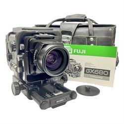 Fuji GX680 camera body with 8x6 film back, serial no. 702610, with 'Fuji EBC Fujion 100mm f4.0' lens, in leather case