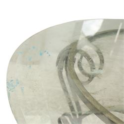 Wrought metal and glass table, with silvered foliate and scrolled design