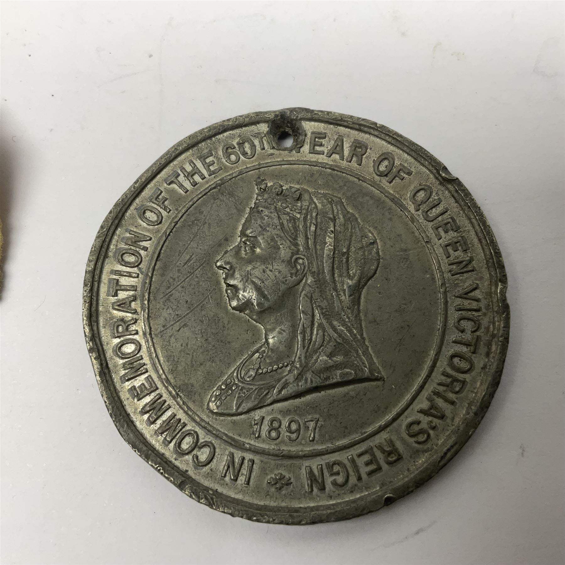 WWI pair of medals comprising Mercantile Marine medal and British War medal, awarded to Dominic L Kelly; both with ribbons and part original packaging and a Victoria Diamond Jubilee medallion.