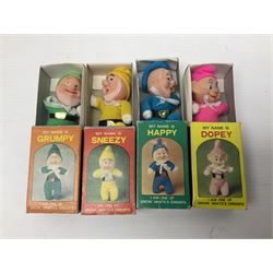 Twenty-six 1970s miniature Beanie matchbox dolls - Donald Duck with Huey, Dewey and Louie; seven dwarfs from Snow White (plus additional Happy); three Rescue Squad; two Cutie Fruitie; four animals; two Black/White series; Micetto; Orsetto Panda; and Uncle Scrooge; all boxed (26)