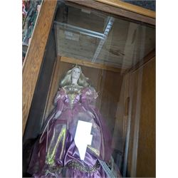 Franklin Heirloom doll, Cinderella, in wooden display case, together with a collection of 'Dolls of the World' and similar
