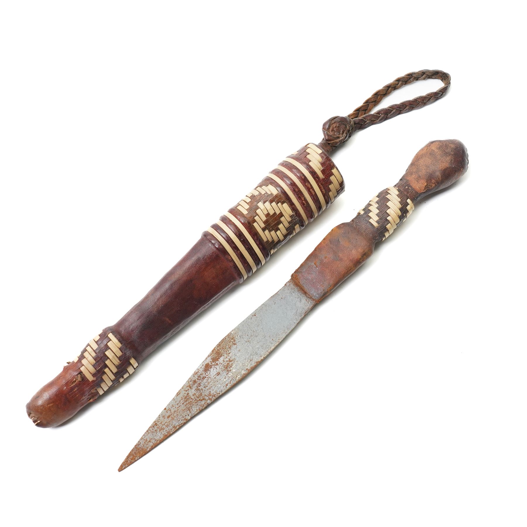 North African arm dagger with leather sheath and one other African dagger (2)