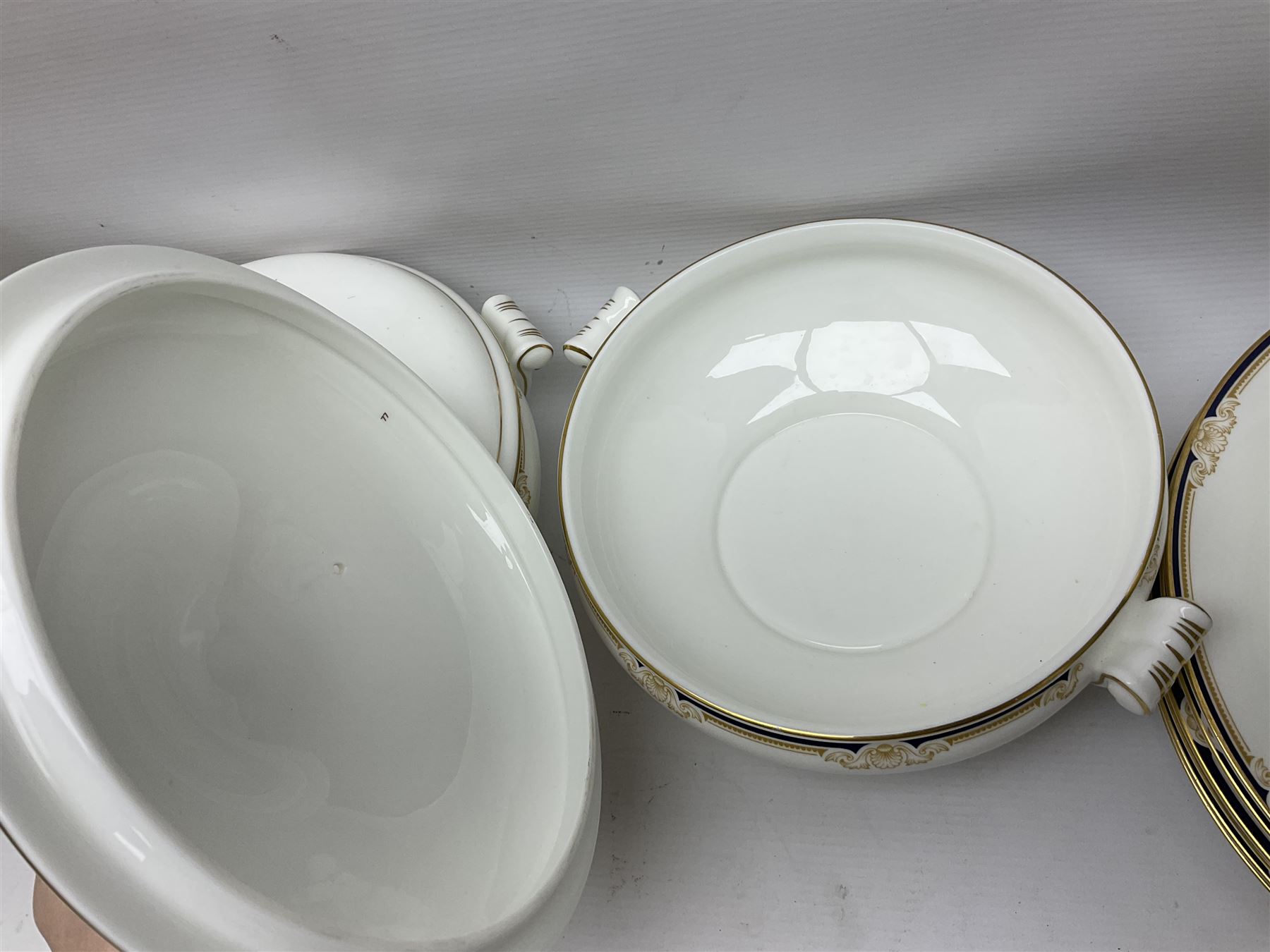 Wedgwood Cavendish pattern dinner service for twelve, comprising dinner plates, side plates, bowls, soup bowls, two tureens, saucer boat and sauce, together with matching part coffee service (82) 