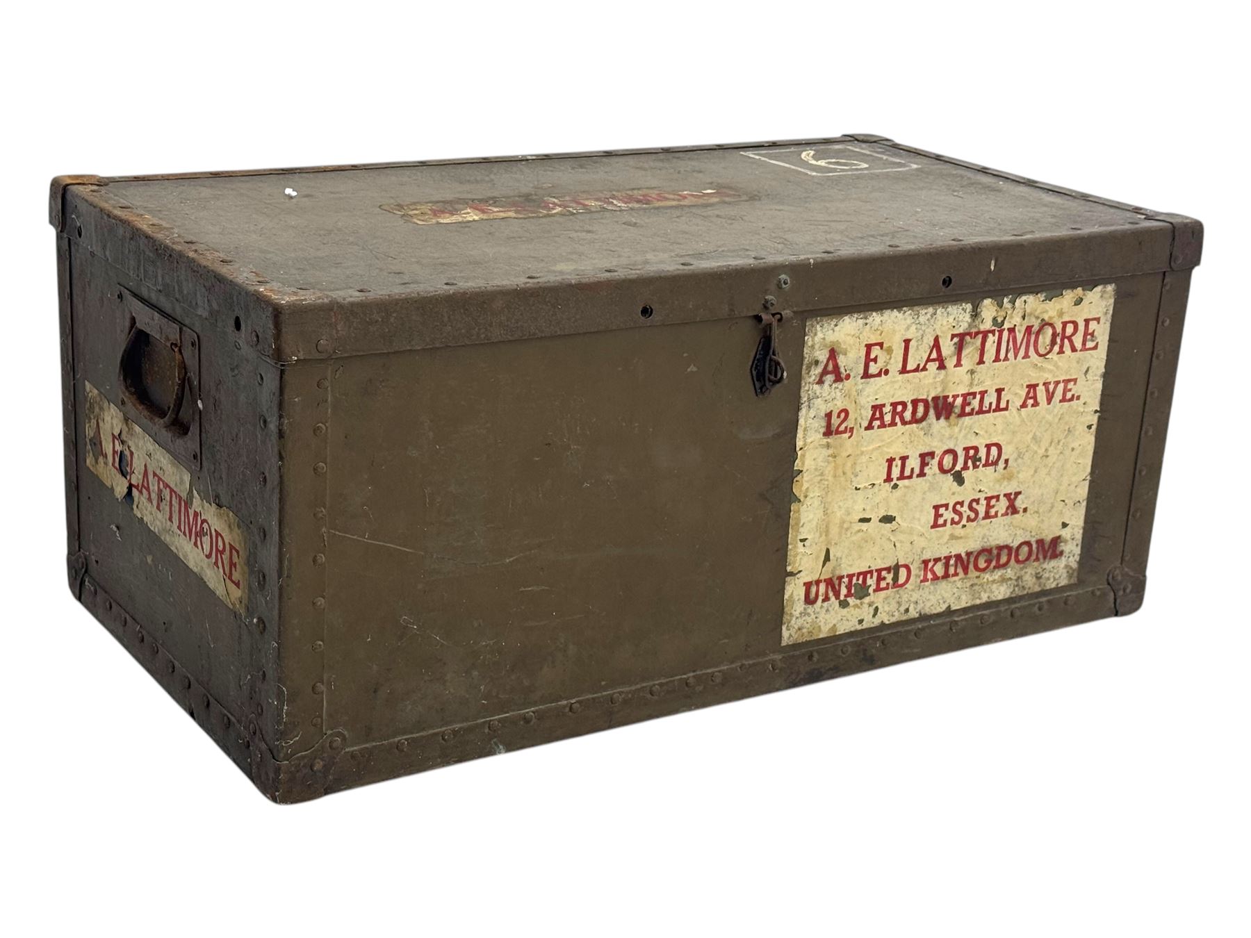 Vintage metal bound steamer trunk, exterior labels reading 