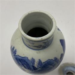 19th century Chinese Kangxi style blue and white jar and cover, decorated with figural and landscape scenes, the domed cover with foo dog finial, with four character marks beneath, H22cm