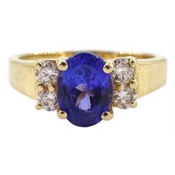 Gold oval tanzanite and round brilliant cut diamond ring, stamped 14K