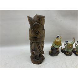 Set of five mud men figures, together with oriental carved hardstone figure, set of oriental thimbles in case, two Netsuke etc