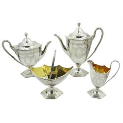 Victorian four piece bachelors tea and coffee service, bright cut Neo Classical design with foliate swags and vacant cartouches, the sugar basket with a swing handle by Elkington & Co, London 1874/77, approx 35.9oz