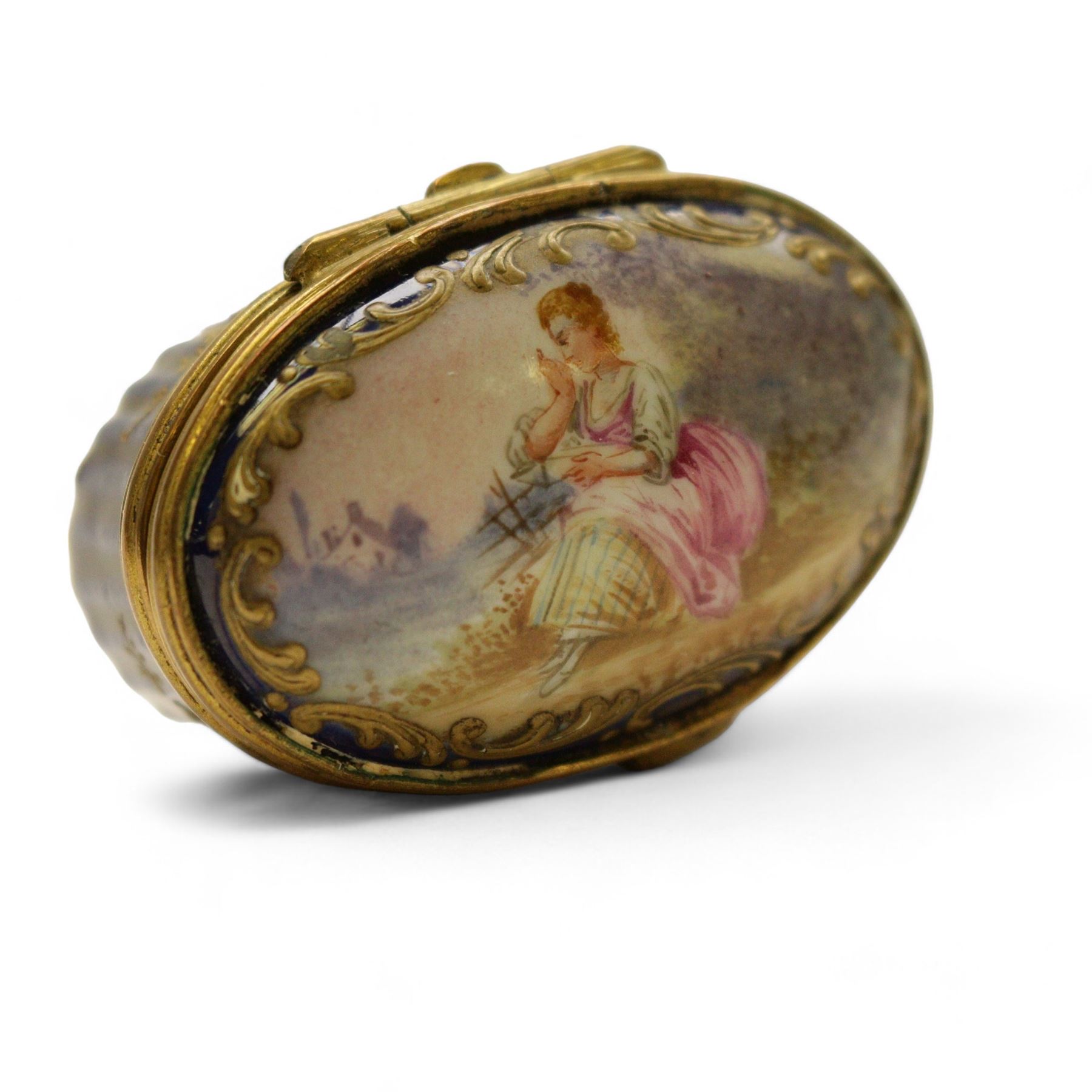 Royal Worcester pill box, decorated with forget-me-nots to the lid, together with two others 