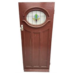 1930s external door with stained leaded glass panel (86cm x 203cm), six small stained glass windows in wooden frames (W52cm); and various loose stained leaded glass panels