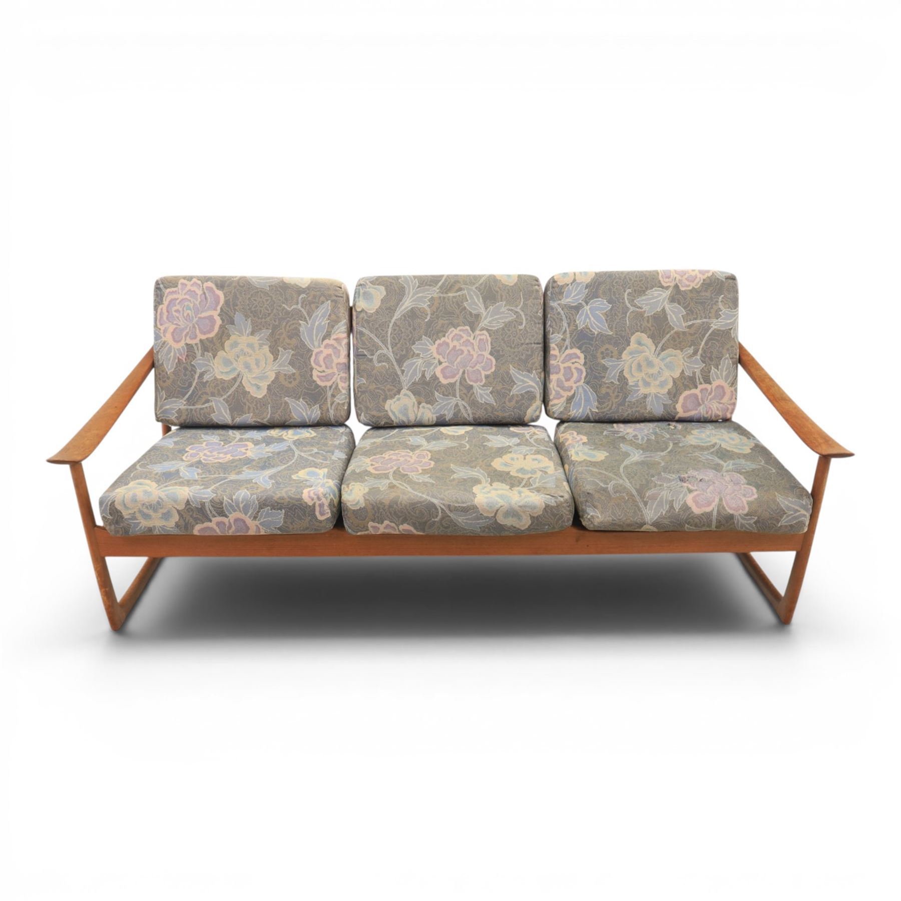 Peter Hvidt and Orla Mølgaard for France and Son - mid-20th century model FD130 teak framed three seater settee, foliate design loose cushion 