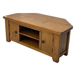 Contemporary mango wood television stand, wide planked surface and angled back corners, central shelving section flanked by twin cupboard doors with square pull handles, raised on stile supports