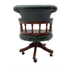 Captains swivel desk chair, upholstered in button green leather, sprung reclining action