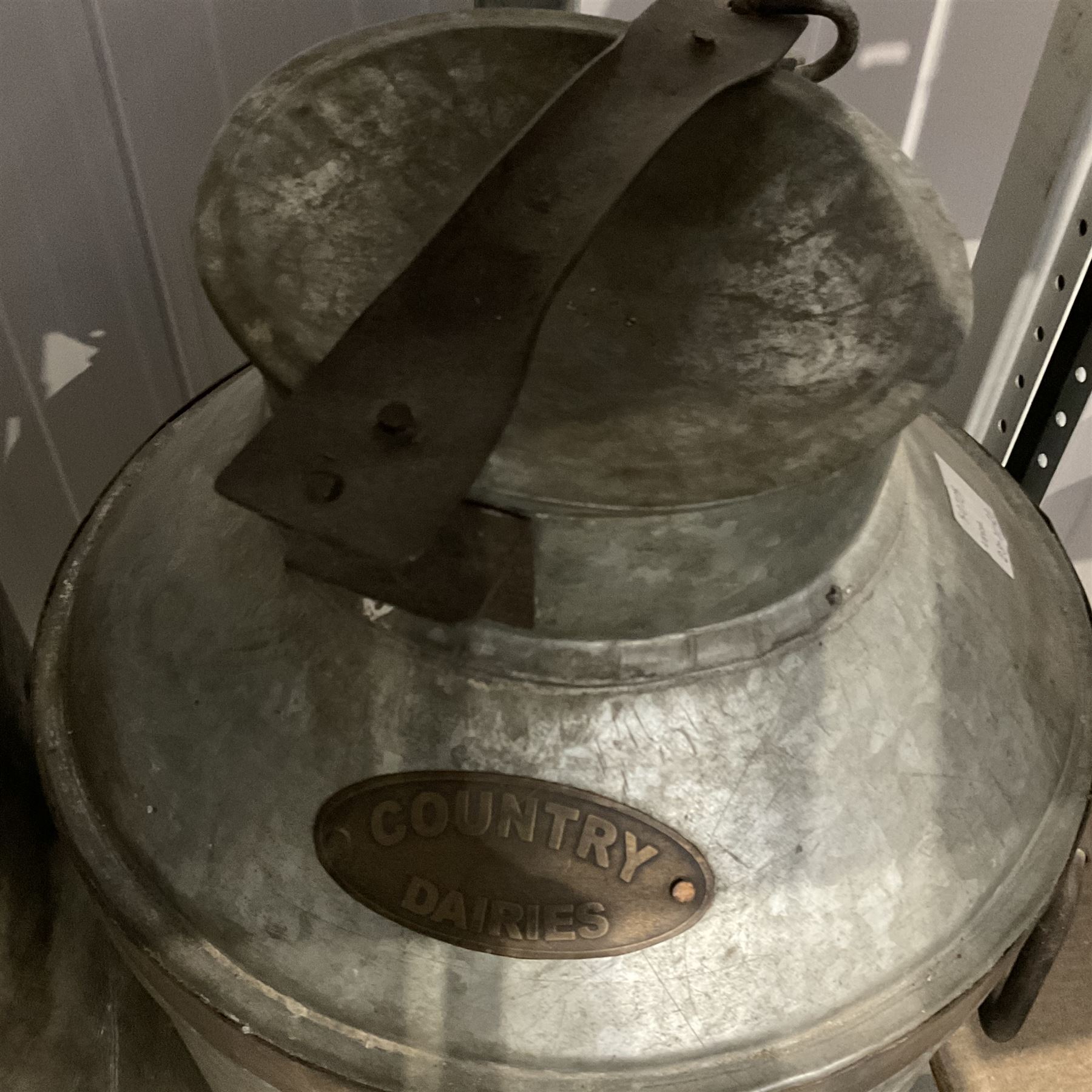 Pair of aluminium vintage milk churns and metal scale - THIS LOT IS TO BE COLLECTED BY APPOINTMENT FROM DUGGLEBY STORAGE, GREAT HILL, EASTFIELD, SCARBOROUGH, YO11 3TX