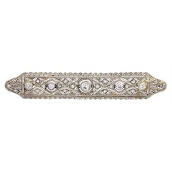 Art Deco 15ct white gold and platinum openwork diamond brooch, milgrain set with round and rose cut diamonds