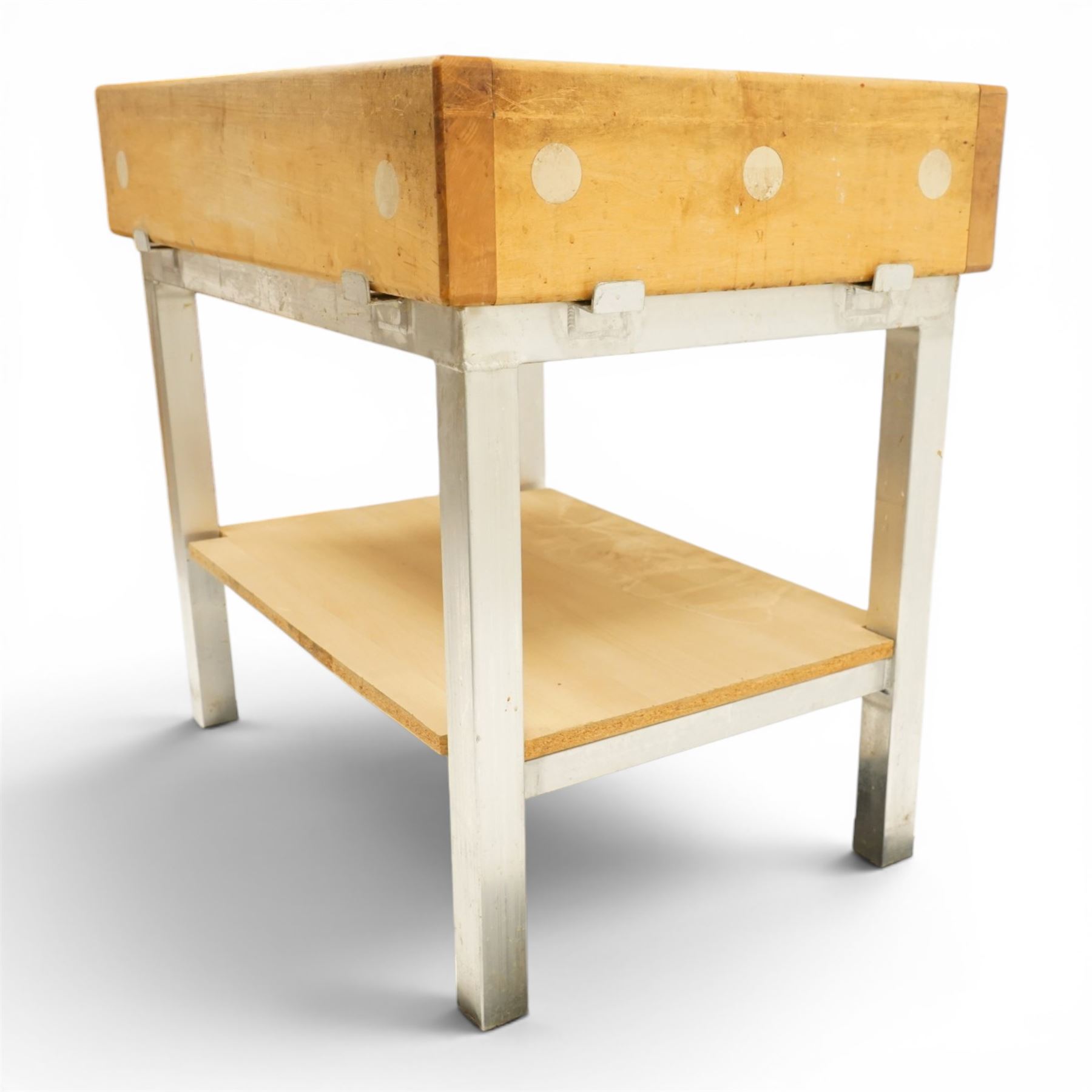 20th century butchers block kitchen island, solid top raised on stainless steel supports united by and undertier