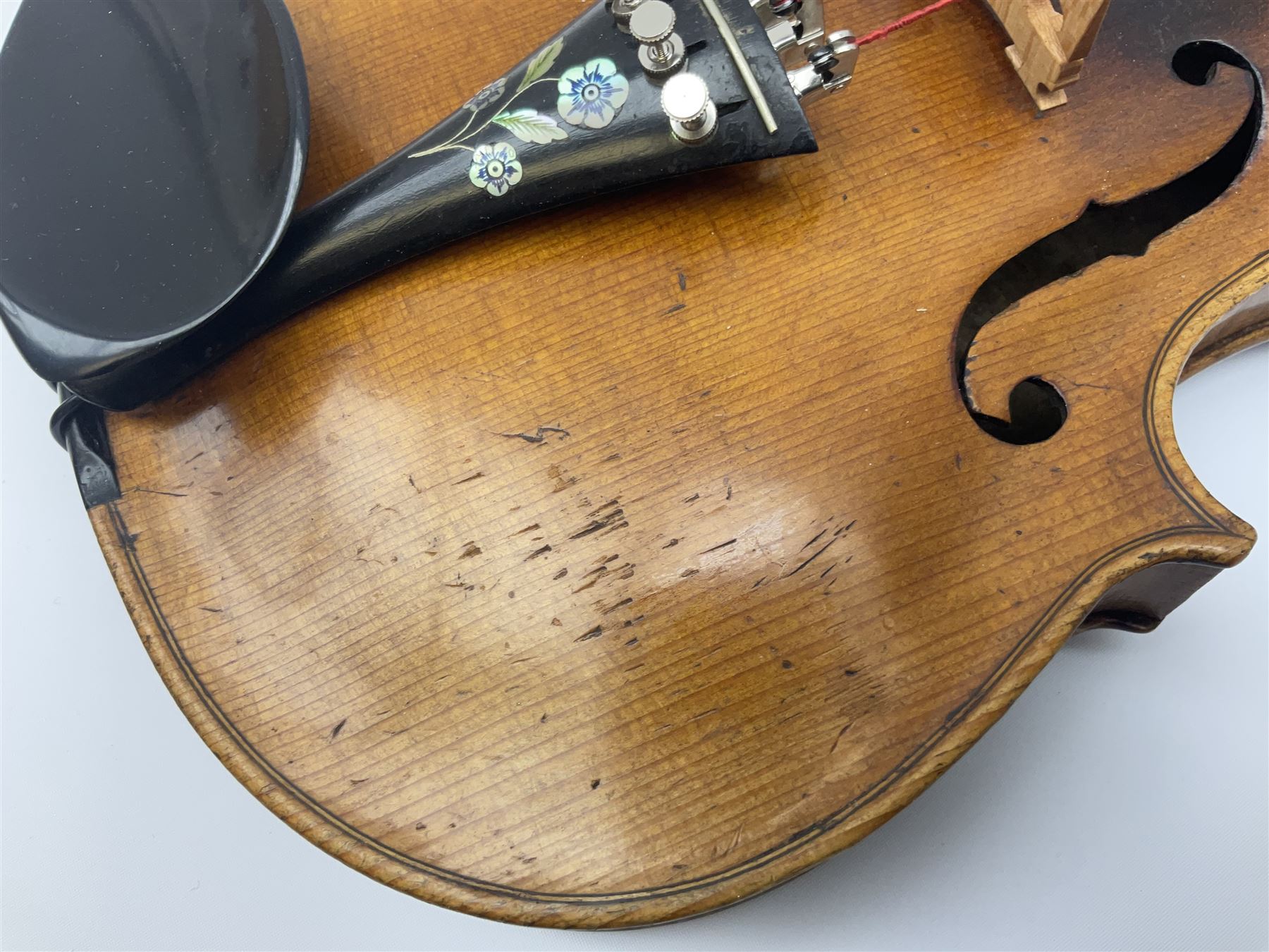 German Saxony violin c1900 with 35.5cm two-piece medium grain maple back and ribs and medium grain spruce top; bears label 'Jacobus Stainer in Absam prope Oenipontum 17xx Made in Germany', 59.5cm overall; with modern bow (2)