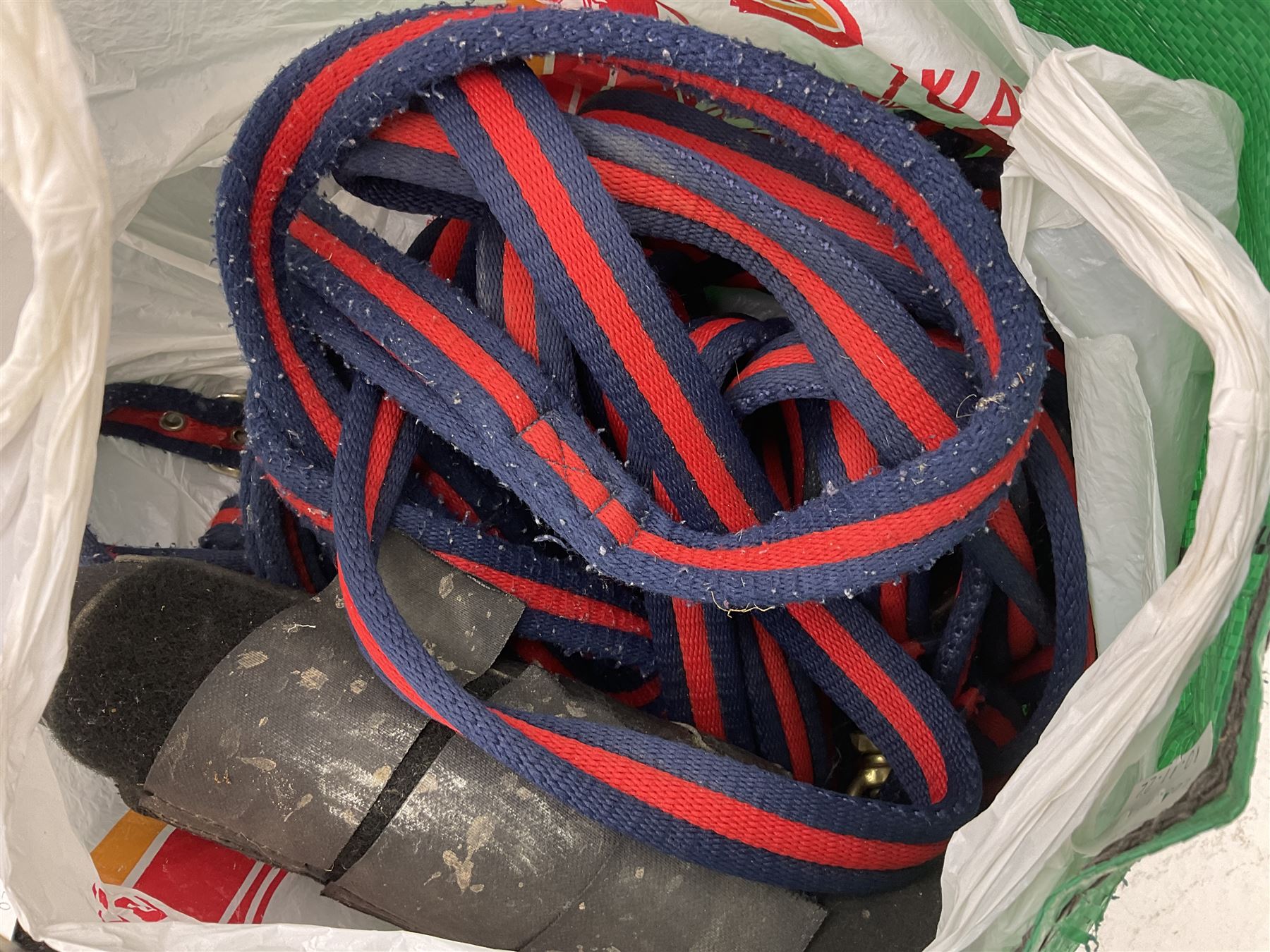 Quantity of horse tack to include bits, bridles, lunging equipment, brushing boots, tail guards, jodpa boots etc  