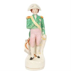 Rare mid 19th century Staffordshire pottery figure of Admiral Lord Nelson, modelled standi...