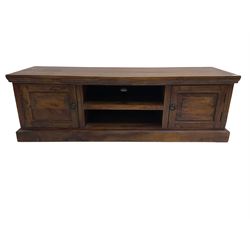 Hardwood television console unit, fitted with open shelves and two cupboards