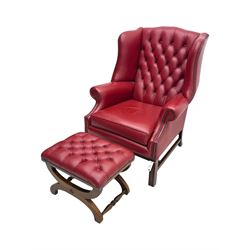Kingsgate - contemporary 'Suffolk' wingback armchair and matching stool, upholstered in red leather with deep button tufting and brass stud trim, raised on square section supports 