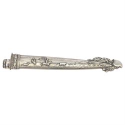 Argentinian Gaucho dagger and scabbard, decorated with oak leaves and cattle scenes with Inox blade, overall L29cm, blade 17cm