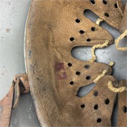 WW2 German Infantry M40 steel helmet with tropical finish and traces of single decal; with chin strap and leather liner marked 57 twice in red; back apron stamped 11 38