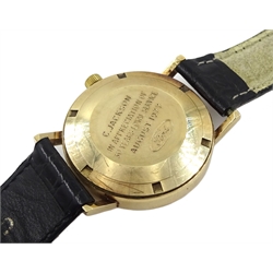 Garrard 9ct gold gentleman's automatic wristwatch, with date aperture, presented by Ford to C Jackson, hallmarked London 1976, on leather strap in original Ford case