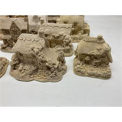 Twenty-three Lilliput Lane models from the Paint Your Own collection, to include Catmint Cottage, Sugar and Spice, Gypsy Cottage, Ruby Cottage and Little Birch, some boxed