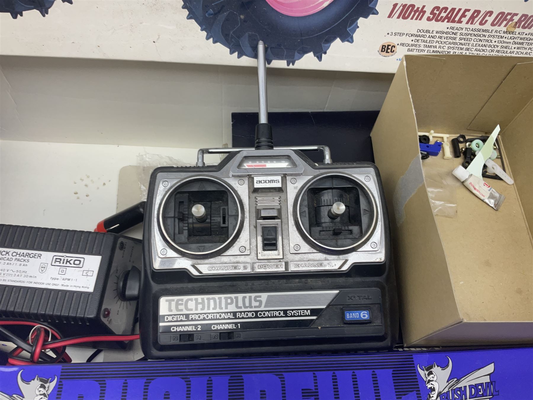 Tamiya ' Bush Devil ' radio controlled truck, with original box, with radio gear and acoms transmitter, and a few accessories, untested