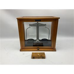 Griffin & George set of laboratory scales in fully glazed hardwood cabinet with rise-and-fall front door L44.5cm H40cm; with beech box of brass weights by Philip Harris & Co Ltd