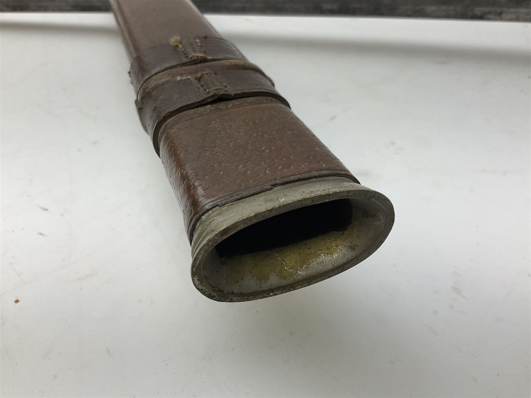 Victorian artillery officer's sword, the 90cm fullered steel blade by E. Thurkle Denmark Street Soho London decorated with Victoria cypher, Regimental crest and 'Royal Artillery', three-bar hilt with stepped pommel and wire-bound fish skin grip; in leather covered scabbard L107cm overall