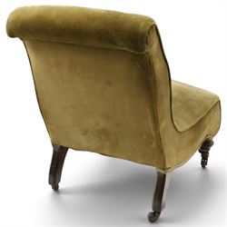 Victorian mahogany framed slipper chair, of reclined shape with rolled back over sprung seat, raised on turned feet with ceramic castors