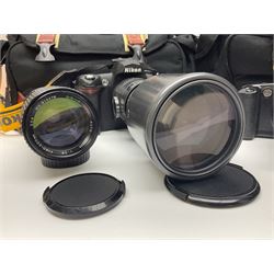 Four camera bodies, to include, Ricoh KR-10 serial no. 38826, Pentax MZ-M serial no. 4185969 with 'SMC Pentax- M 1:3.5 28mm' lens, Canon EOS500 serial no. 080927, with 'Sigma Zoom 100-300mm 1:4.5-6.7 DL'  lens etc, with other camera lenses and equipment 