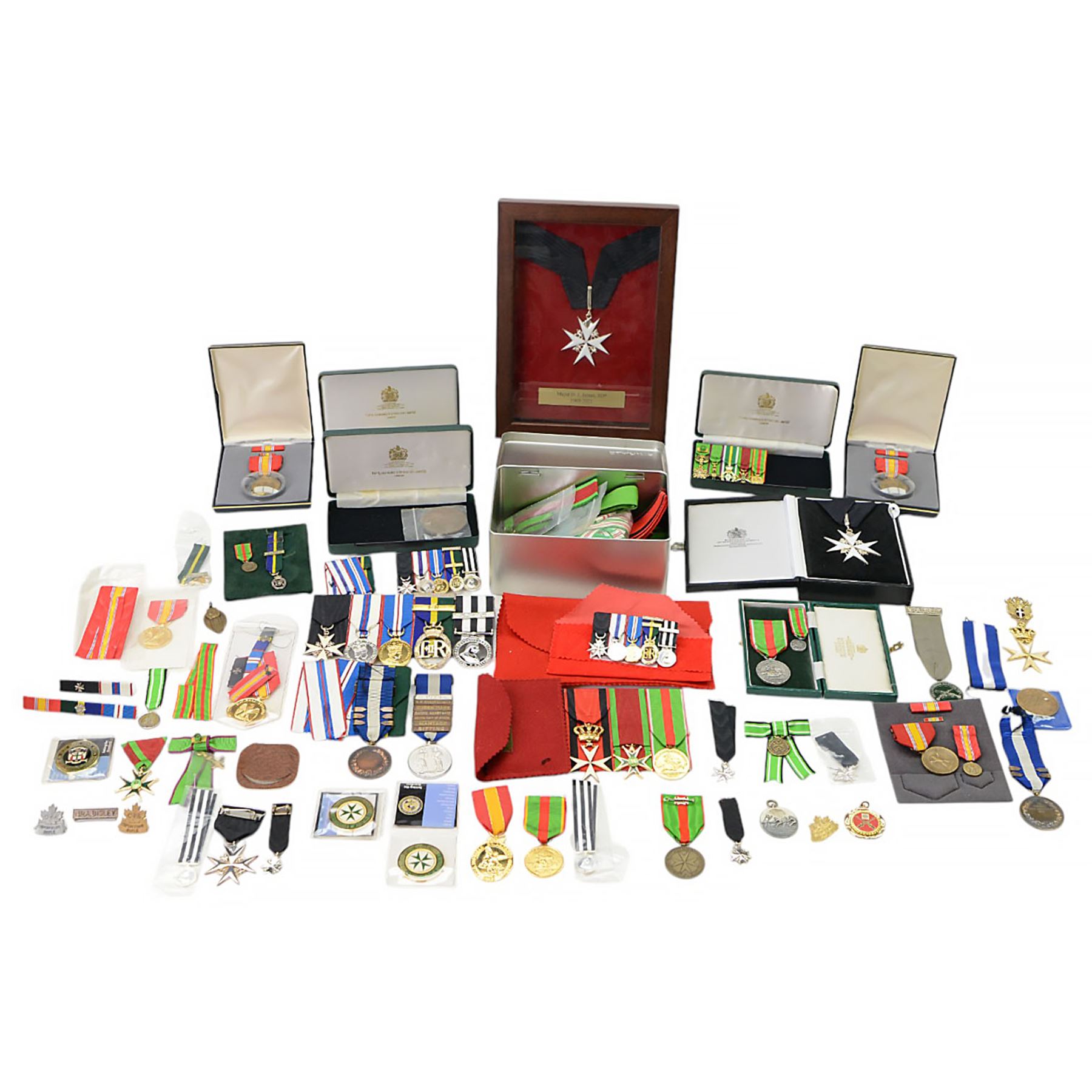 Collection of medals, insignias and minitures, including American National Defence medals, Efficiency Decoration medal, Order of St. John of Jerusalem stars, Military and Hospitaller Order of St. Lazarus of Jerusalem medals etc, several by Toye, Kedding & Spencer Ltd and Worcestershire Medal Service Ltd