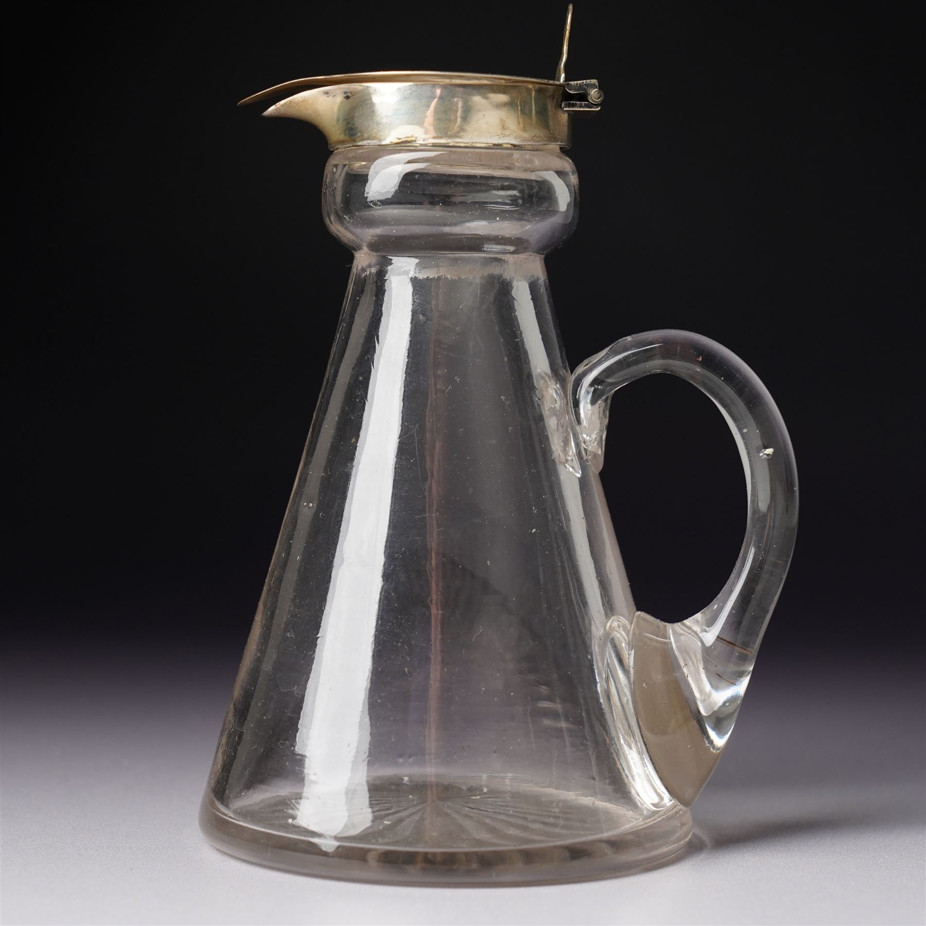 George V glass whisky noggin with hinged silver lid H10.5cm Birmingham  1912 and a silver sauce boat with C scroll handle Birmingham 1973 (2)