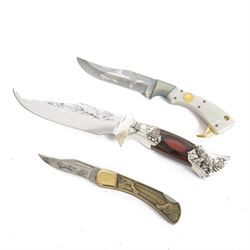 Franklin Mint knives, comprising Red Fox Knife, Great White Shark Knife and The Gold Rush Bowie Knife, in display case with certificates