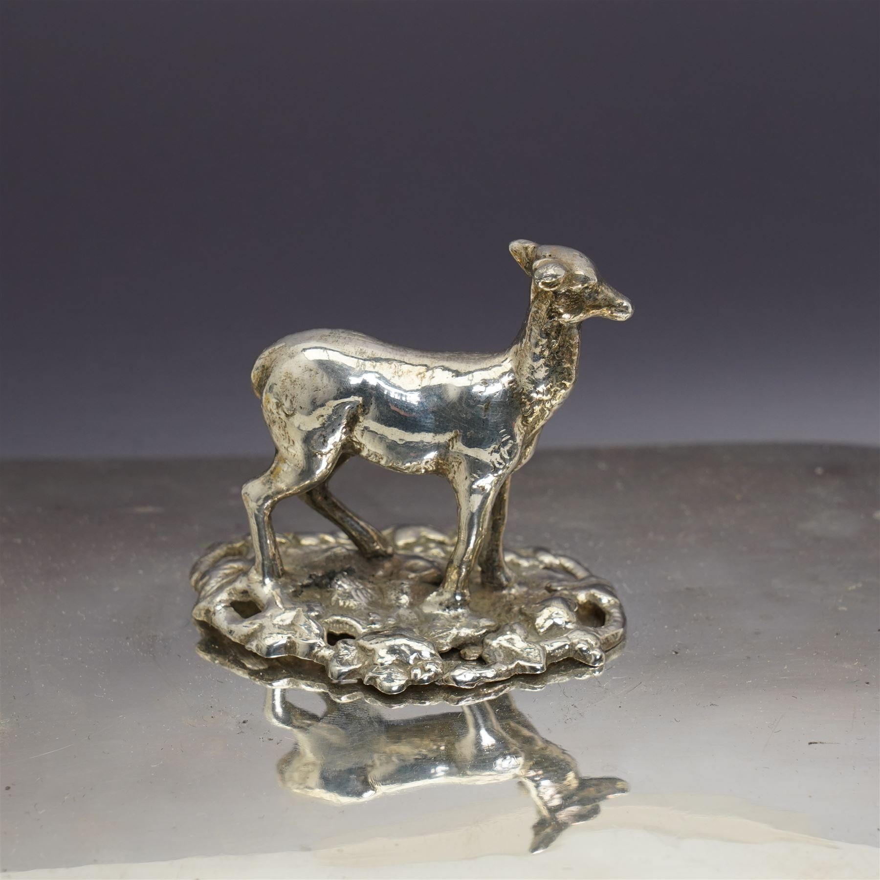 Pair of Georgian design plated candlesticks on square bases H26cm, plated hot water dish, the cover with deer lift and a plated two handled tureen with associated cover