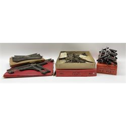 Hornby '0' gauge - layout accessories comprising PR1/PL1 Points, CR1 Right Angle Crossing and CA2 Acute Angle Crossing, all boxed; tin-plate signal box; tin-plate level crossing; textured wooden tunnel, possibly pre-WW2; and quantity of track, some boxed; together with '00' gauge tin-plate station