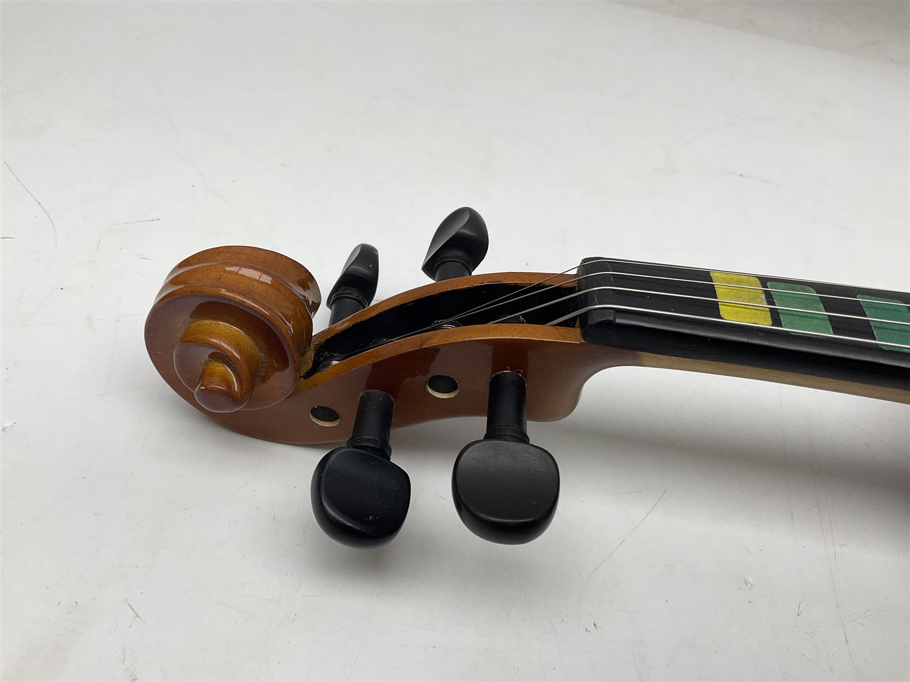Four student violins - two Chinese three-quarter size with 33.5cm and 34cm two-piece backs; Stringers of Edinburgh quarter size with 28cm two-piece back; and Stentor quarter size with 28cm two-piece back; each in carrying case (4)