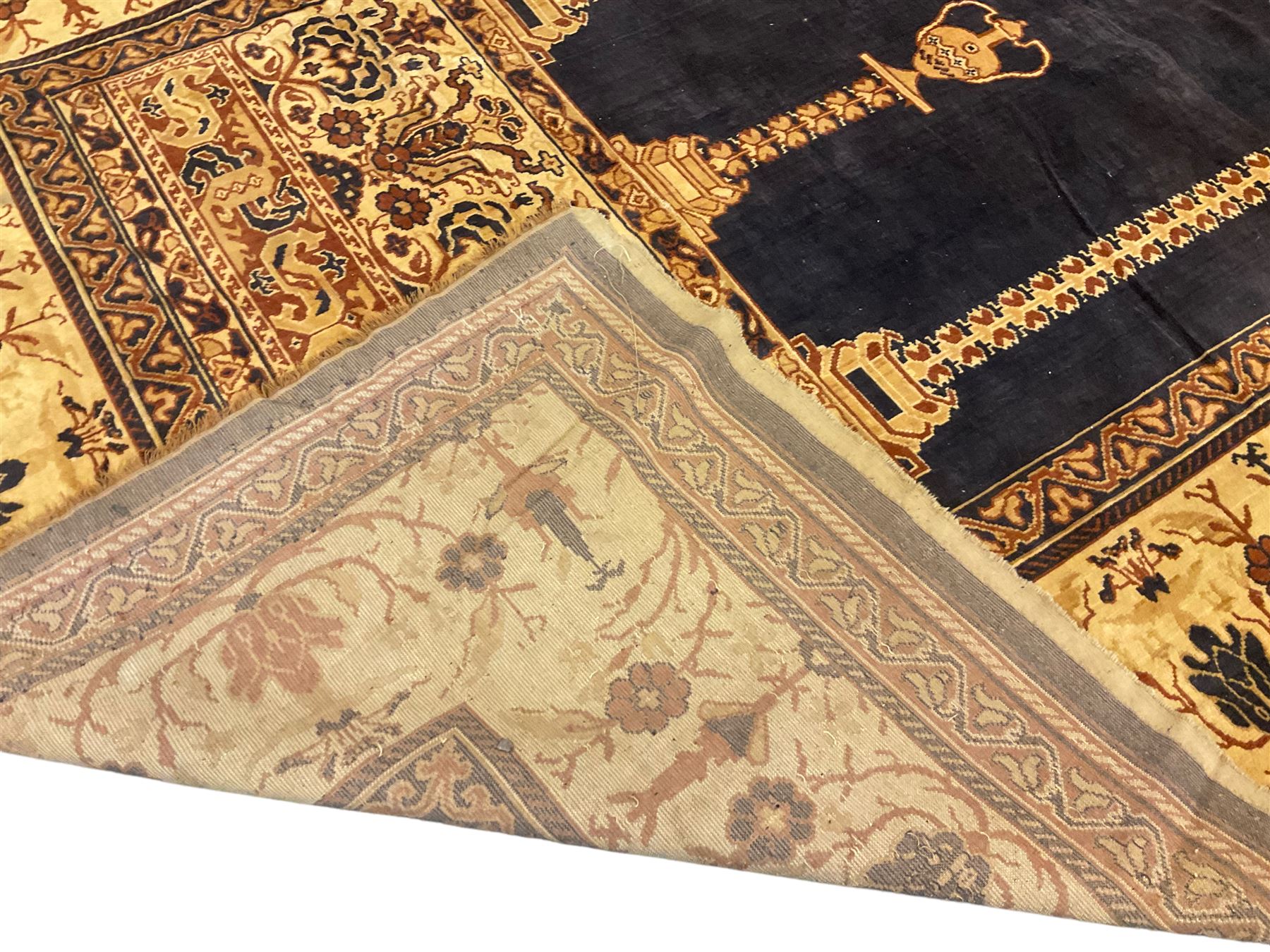 Persian ivory ground rug, central Mirab motif surrounded by floral