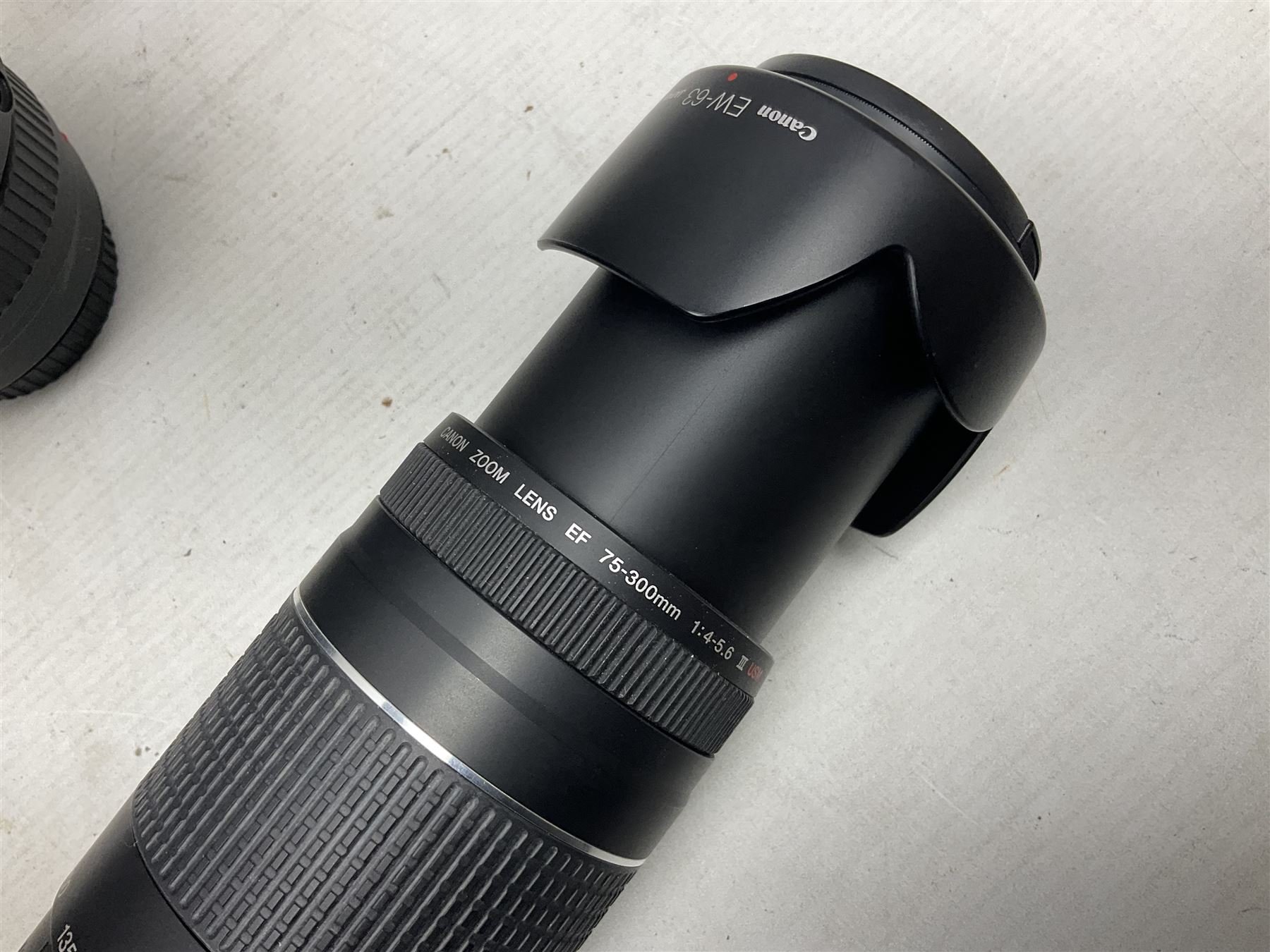 Canon Eos 7D camera body, serial number 3261306344, with 'Canon Ultrasonic EF 24-105mm Macro 0.45m/1.5ft Ultrasonic' Lens, 'Canon Zoom EF 75-300, 1;4-5.6 III' lens and Teleplus Pro 300 lens, together with tripod and original camera box 