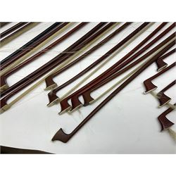 Twenty-eight violin/cello bows/part bows in pernambuco, brazilwood, fibre-glass etc